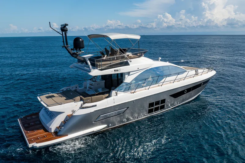 Slide: The Image of 2021 Azimut S6 Sportfly yacht cruising on open sea under clear skies. - 20