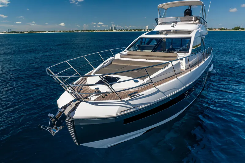 Slide: The Image of 2021 Azimut S6 Sportfly yacht cruising on open blue waters. - 28