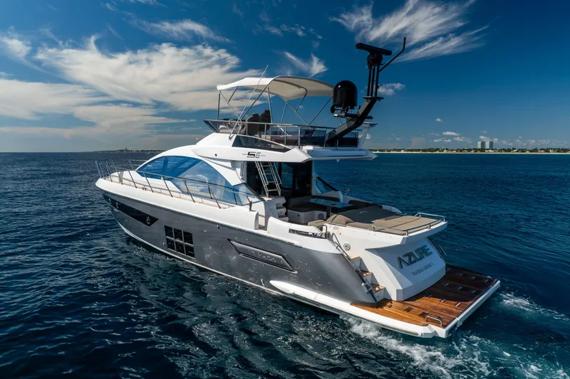 Slide: The Image of 2021 Azimut S6 Sportfly yacht cruising on open blue sea. - 31