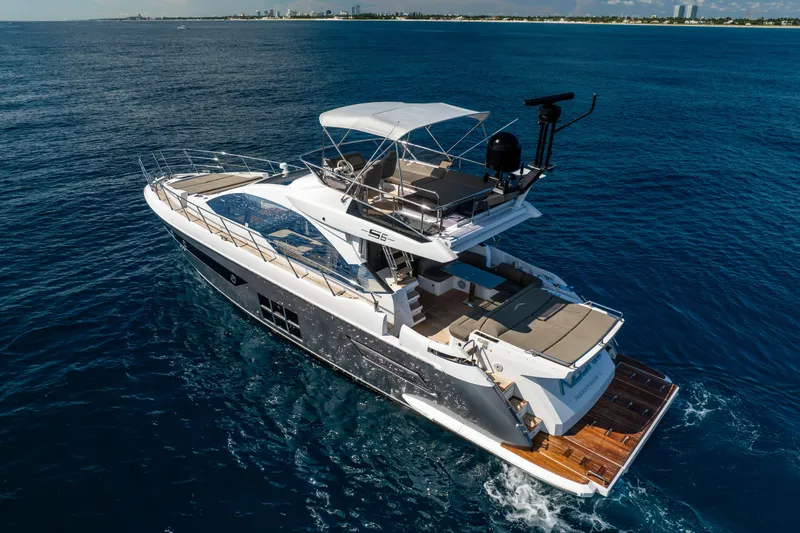 Slide: The Image of 2021 Azimut S6 Sportfly yacht cruising on open blue sea. - 32