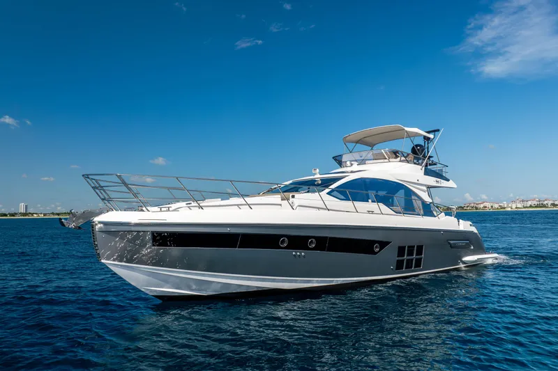 Slide: The Image of 2021 Azimut S6 Sportfly yacht cruising on open blue waters. - 38