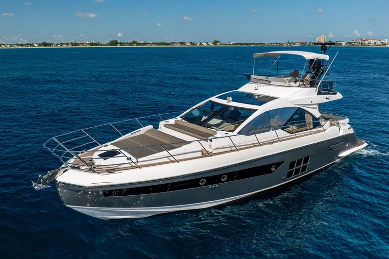 Slide: The Image of 2021 Azimut S6 Sportfly yacht with sleek design and spacious deck on open water. - 39