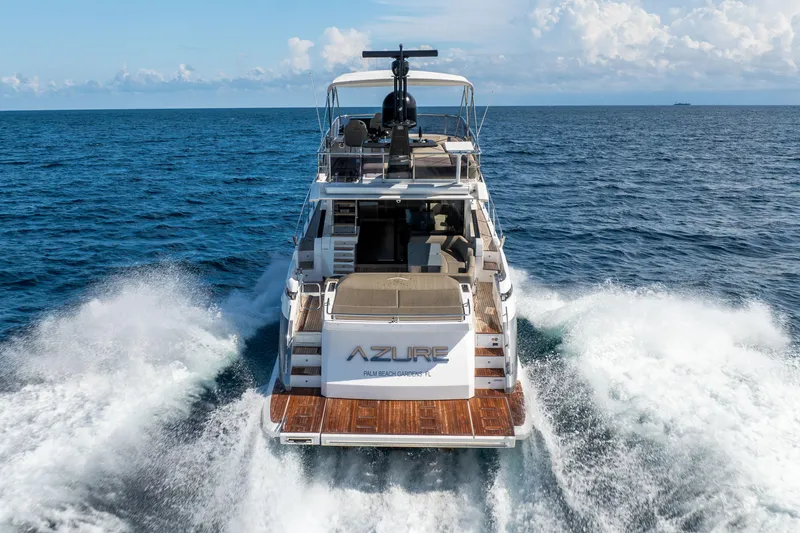Slide: The Image of 2021 Azimut S6 Sportfly yacht cruising on open sea, showcasing luxury and performance. - 48