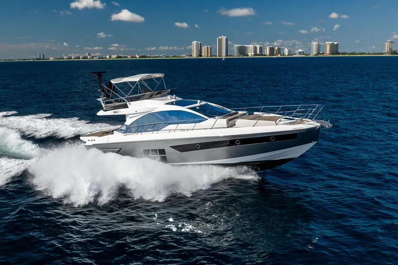 Slide: The Image of Luxurious bathroom interior of 2021 Azimut S6 Sportfly yacht with modern fixtures and porthole window. - 59