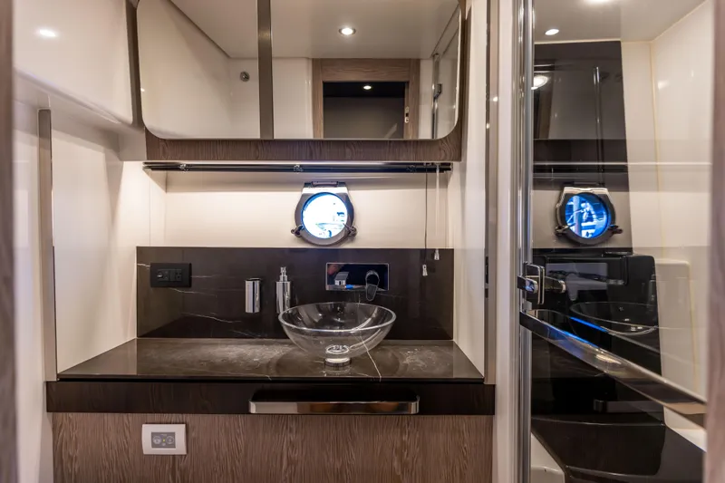 Slide: The Image of Luxurious bathroom in 2021 Azimut S6 Sportfly yacht with glass sink and modern fixtures. - 60