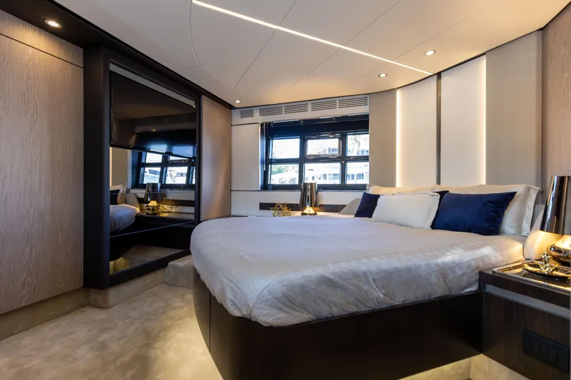 Slide: The Image of Luxurious interior of 2021 Azimut S6 Sportfly yacht with elegant seating and window view. - 73