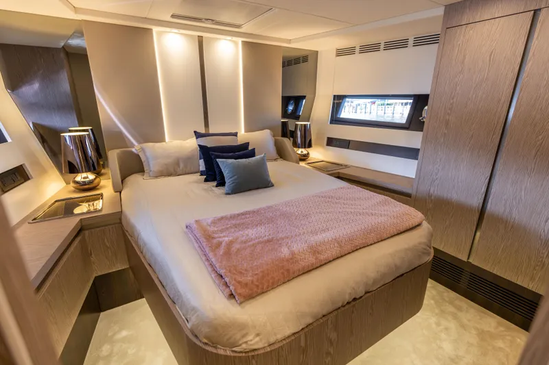 Slide: The Image of Luxurious bedroom interior of 2021 Azimut S6 Sportfly yacht with modern design and ambient lighting. - 77