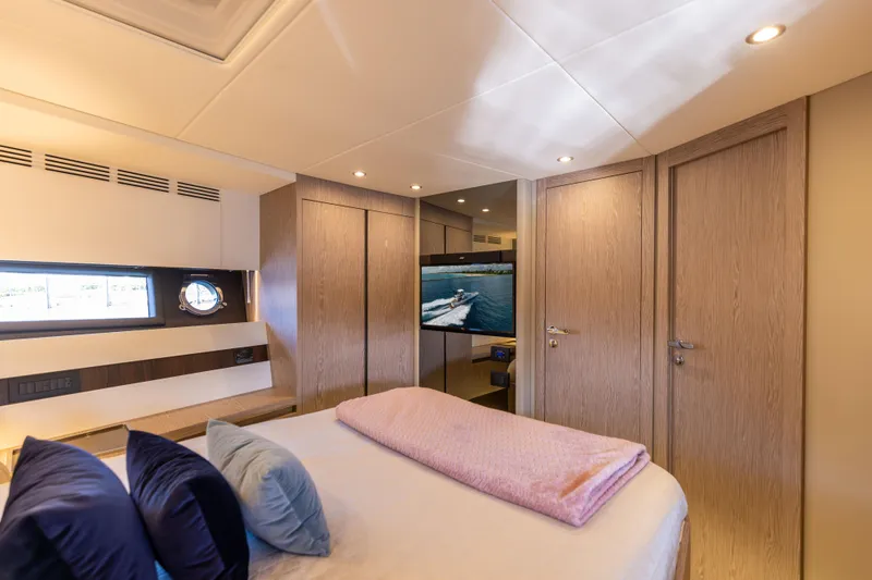 Slide: The Image of Luxurious bedroom interior of 2021 Azimut S6 Sportfly yacht with modern design and cozy ambiance. - 80