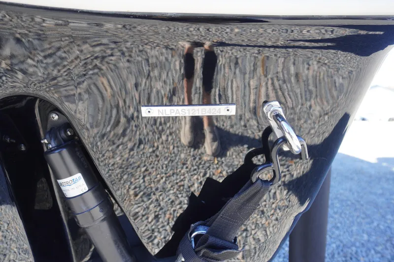 Slide: The Image of 2024 Tidewater 232 SS boat hull with serial number and hardware details. - 45