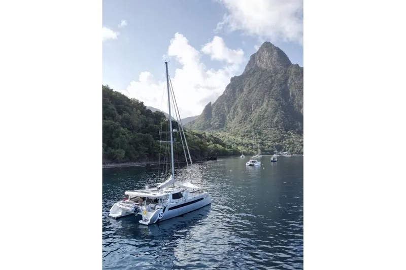 The Image of 2024 Balance 482 catamaran sailing on sparkling blue water. - 0