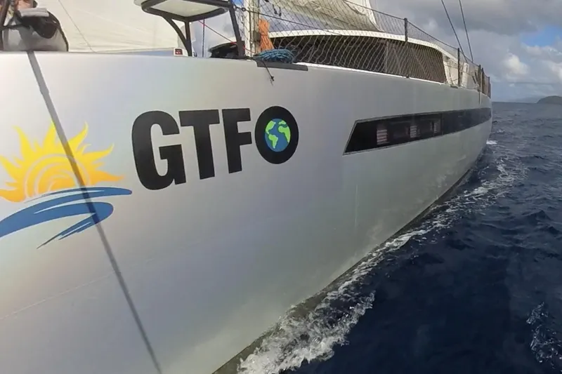 Slide: The Image of Sailing catamaran Balance 482, 2024 model, cruising on open water. - 1