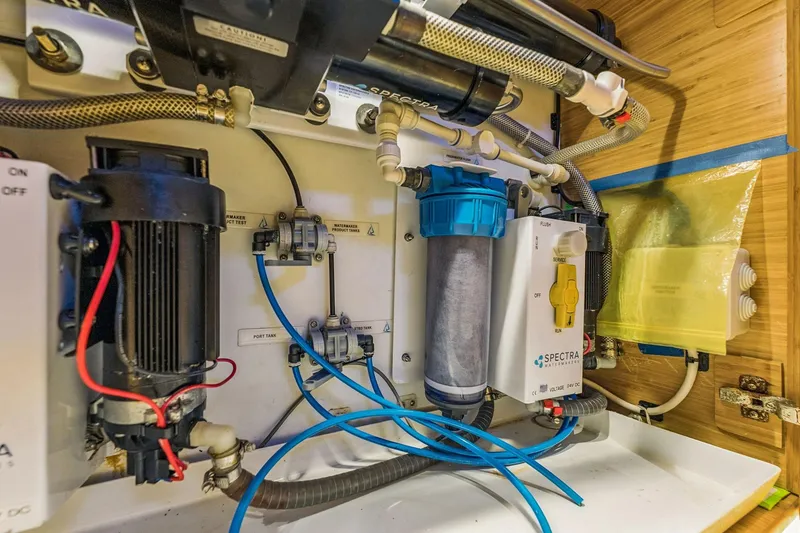 Slide: The Image of 2024 Balance 482 water filtration system with pipes and control panel. - 103