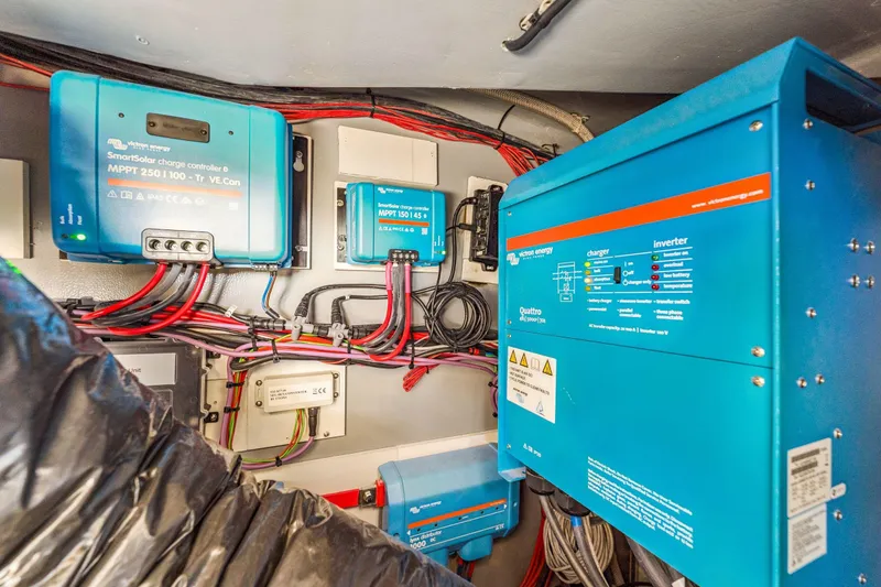 Slide: The Image of Electrical system with Balance 482 model components, featuring charge controllers and inverter, 2024. - 111