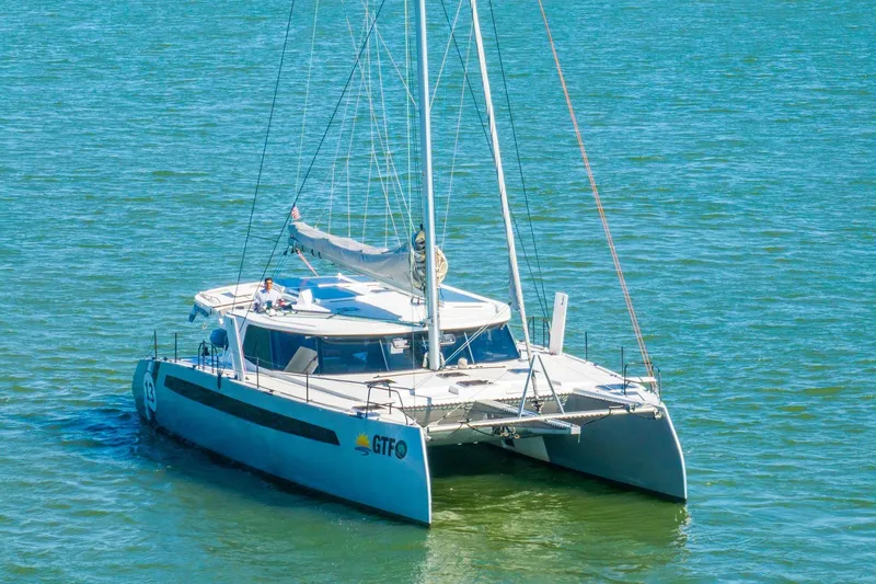 Slide: The Image of 2024 Balance 482 catamaran sailing on calm waters. - 141
