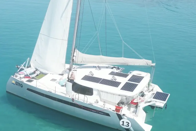 Slide: The Image of Top view of 2021 Balance 482 catamaran layout with deck and cabin details. - 2