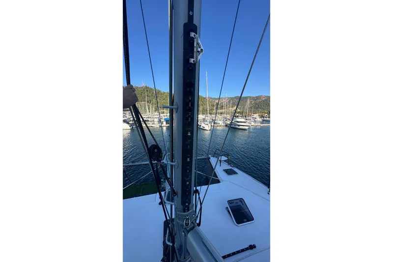 Slide: The Image of 2024 Balance 482 yacht interior with panoramic windows, modern seating, and wooden accents. - 37