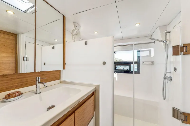 Slide: The Image of Modern bathroom interior on 2024 Balance 482 yacht, featuring sleek design and wooden accents. - 84