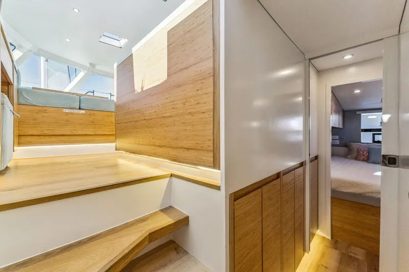 Slide: The Image of Modern interior of 2024 Balance 482 yacht with wooden finishes and cozy bedroom. - 89