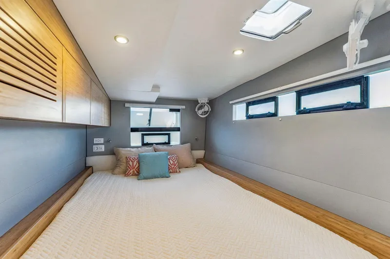 Slide: The Image of Luxurious cabin interior of 2024 Balance 482 yacht with modern bedding and natural light. - 91