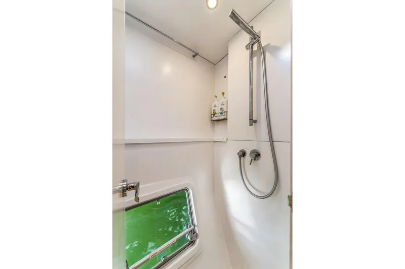 Slide: The Image of Modern shower in 2024 Balance 482 model, featuring sleek design and window view. - 94