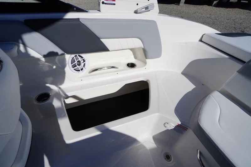 Slide: The Image of Interior of 2026 Chaparral 23 SSi boat, featuring seating and speaker system. - 40