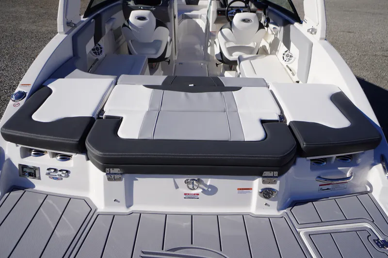 Slide: The Image of 2026 Chaparral 23 SSi boat interior with sleek seating and modern design. - 55