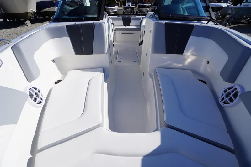 Slide: The Image of 2026 Chaparral 23 SSi boat interior with spacious seating and modern design. - 9