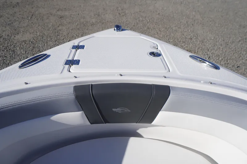 Slide: The Image of 2026 Chaparral 23 SSi boat bow with sleek white and black seating design. - 4
