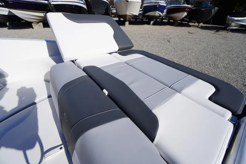 Slide: The Image of 2026 Chaparral 23 SSi boat interior with sleek, modern seating design. - 47
