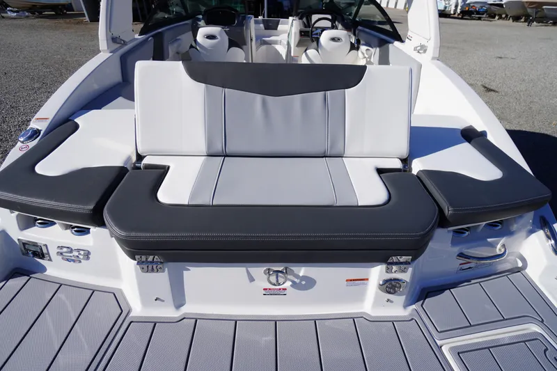 Slide: The Image of 2026 Chaparral 23 SSi boat interior with sleek seating and modern design. - 54