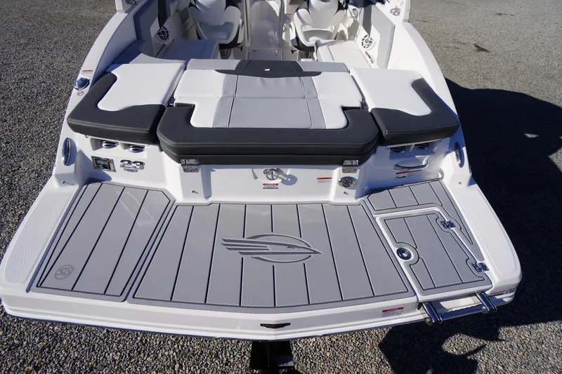 Slide: The Image of 2026 Chaparral 23 SSi boat with sleek swim platform and comfortable seating. - 56