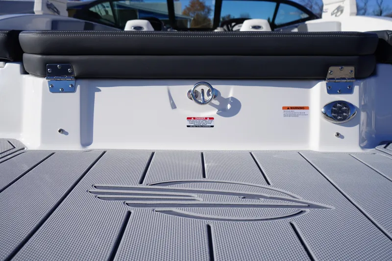 Slide: The Image of 2026 Chaparral 23 SSi boat deck with logo and seating detail. - 59