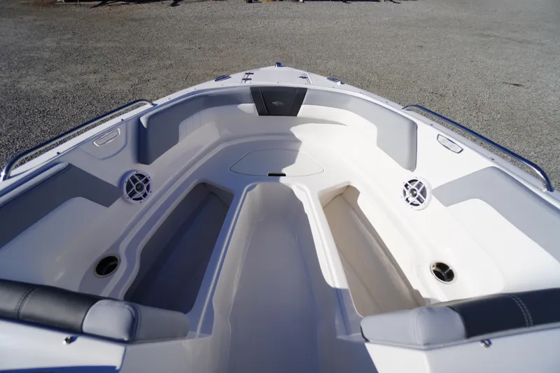 Slide: The Image of 2026 Chaparral 23 SSi boat interior, featuring spacious seating and modern design. - 10