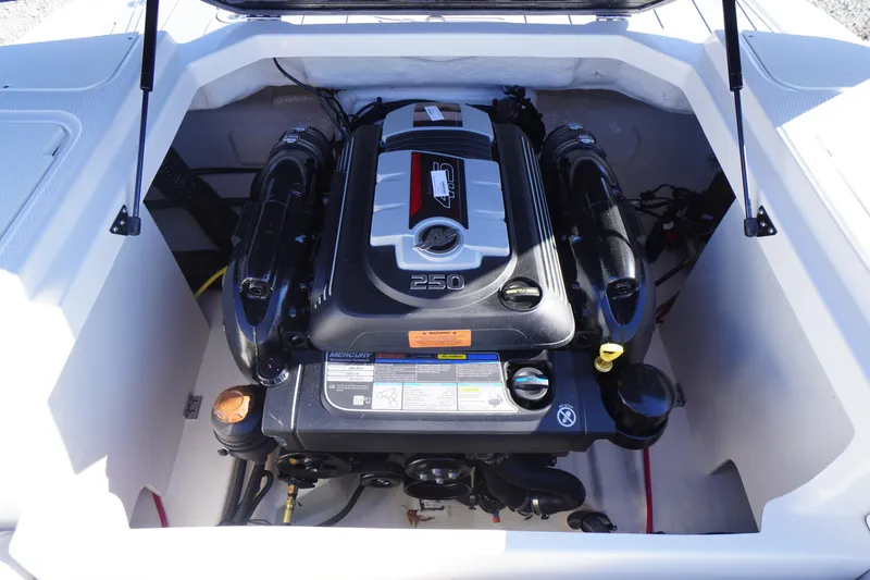 Slide: The Image of 2026 Chaparral 23 SSi boat engine compartment with Mercury 250 engine. - 51