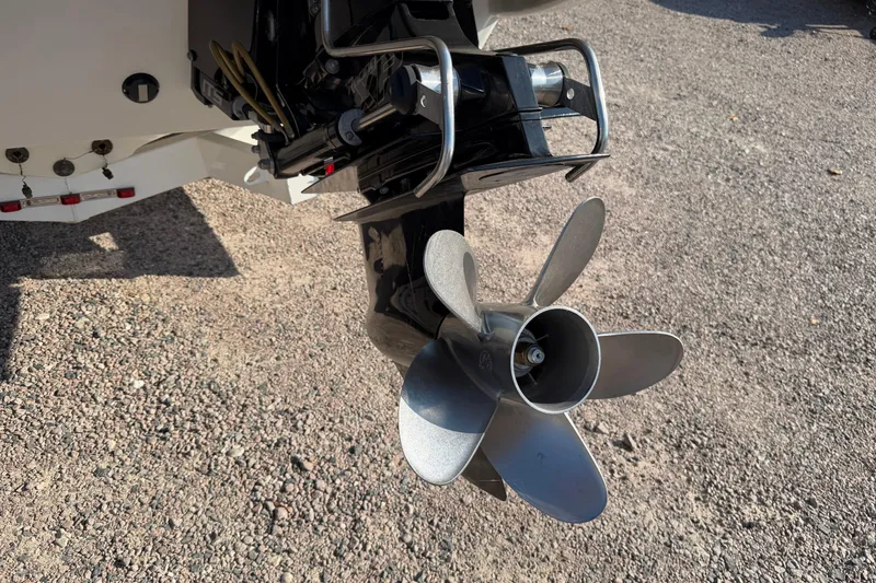 Slide: The Image of 2019 Formula 353 FASTech boat dashboard with steering wheel and Mercury gauges. - 11