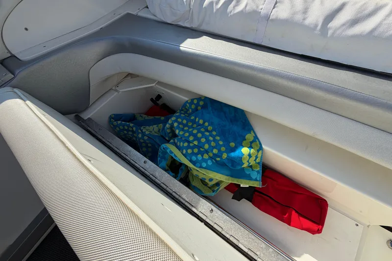 Slide: The Image of 2019 Formula 353 FASTech boat with blue and silver detailing on a trailer. - 22