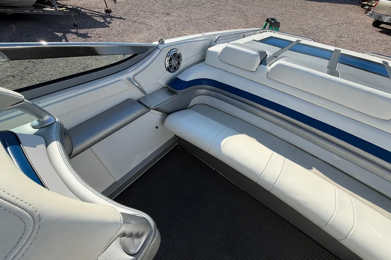 Slide: The Image of 2019 Formula 353 FASTech boat on trailer, blue and white design, parked outdoors. - 31