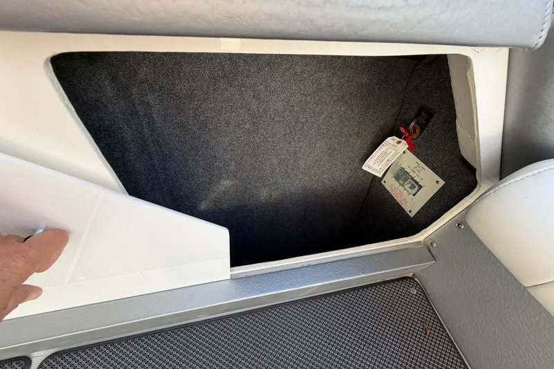 Slide: The Image of 2019 Formula 353 FASTech boat on trailer, parked outdoors under clear sky. - 32