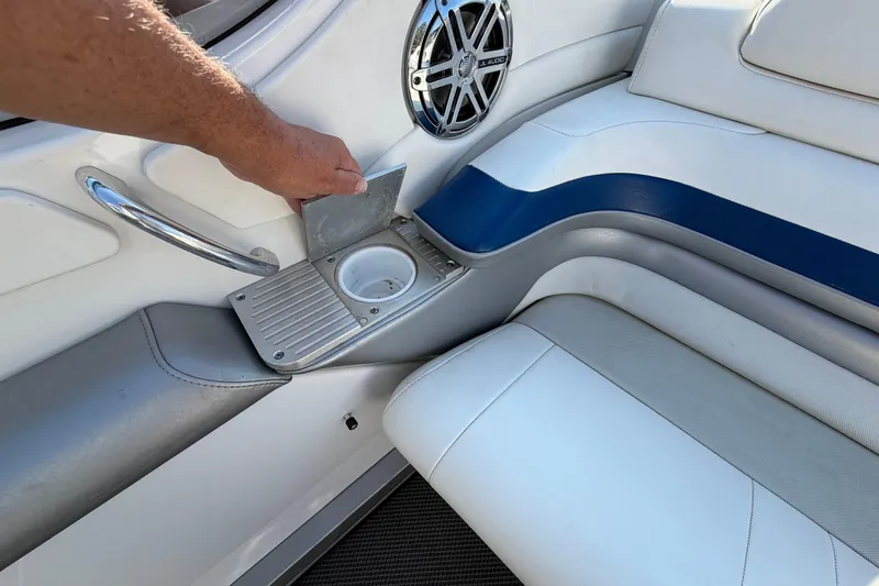Slide: The Image of Storage compartment in 2019 Formula 353 FASTech boat, featuring carpeted interior and identification tags. - 37
