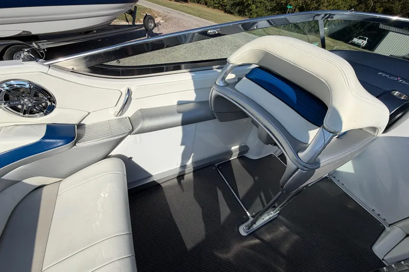 Slide: The Image of 2019 Formula 353 FASTech boat on a trailer, featuring sleek blue and white design. - 38