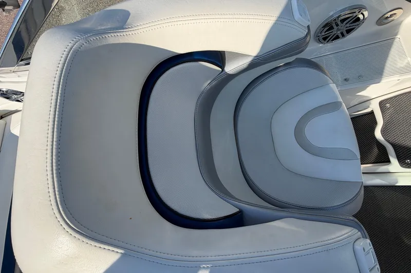 Slide: The Image of 2019 Formula 353 FASTech boat with sleek blue and white design on trailer. - 40