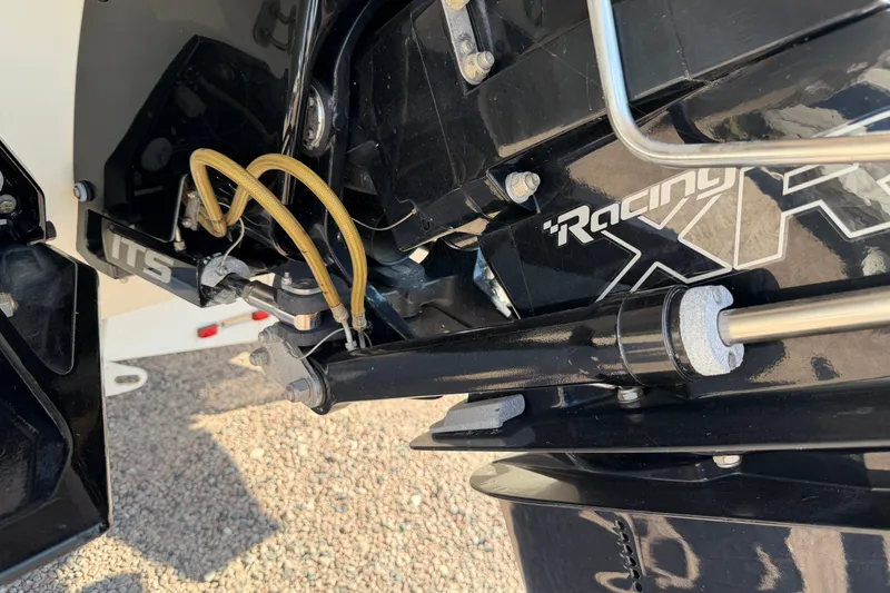 Slide: The Image of 2019 Formula 353 FASTech boat on trailer, dual propellers visible, parked outdoors. - 41