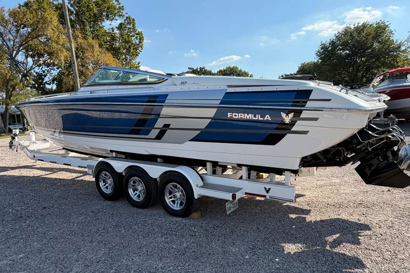 Slide: The Image of 2019 Formula 353 FASTech boat logo against a clear blue sky. - 5