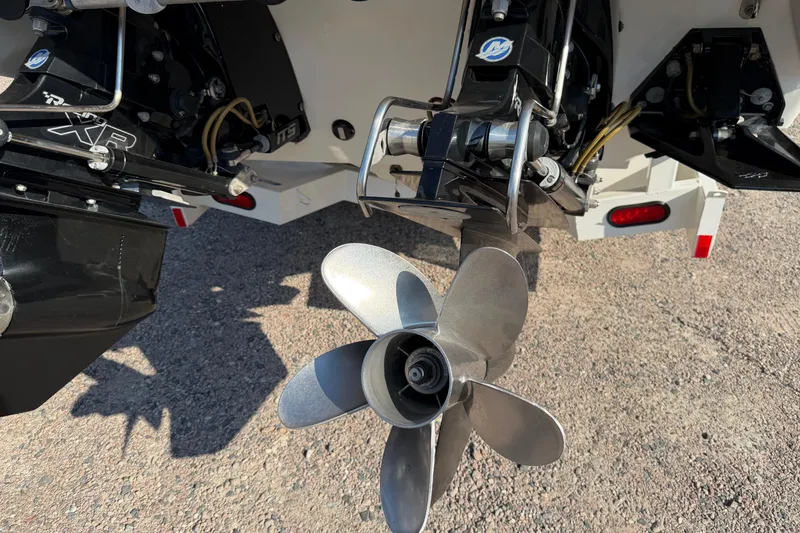 Slide: The Image of 2019 Formula 353 FASTech boat propeller and drive system on a gravel surface. - 50