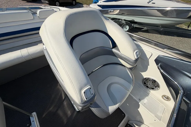 Slide: The Image of 2019 Formula 353 FASTech boat interior with luxurious seating and speaker detail. - 56
