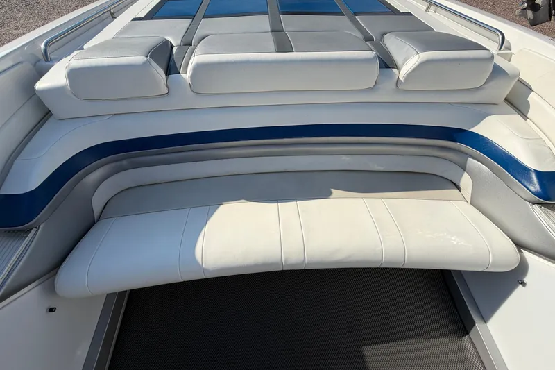 Slide: The Image of 2019 Formula 353 FASTech boat interior with white and blue cushioned seating. - 62