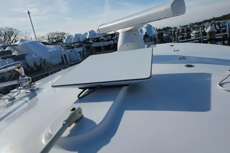 Slide: The Image of 2022 Regulator 34 boat with advanced radar and navigation equipment on deck. - 20