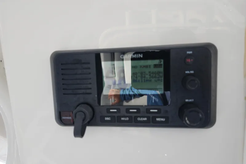 Slide: The Image of Garmin marine radio on 2022 Regulator 34 boat dashboard. - 21