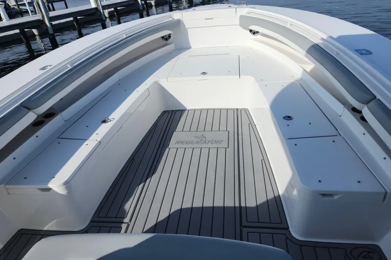Slide: The Image of 2022 Regulator 34 boat interior with spacious seating and sleek design. - 30