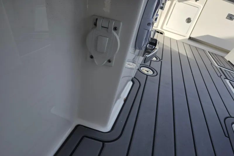 Slide: The Image of 2022 Regulator 34 boat deck with sleek, modern design and integrated features. - 37